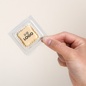 Praline Oxide Crystal solo mit beliebigem Druck für Unternehmen in der Hand präsentiert