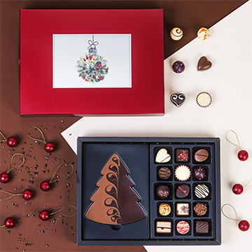 Dekorativ verpackte Weihnachts-ChocoPostcard Maxi rot