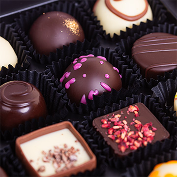 Adventskalender Obsession mit Pralinen